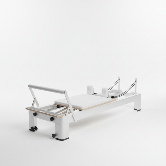 FlexPeak Home Pilates Reformer Machine - modern white and silver design on white background